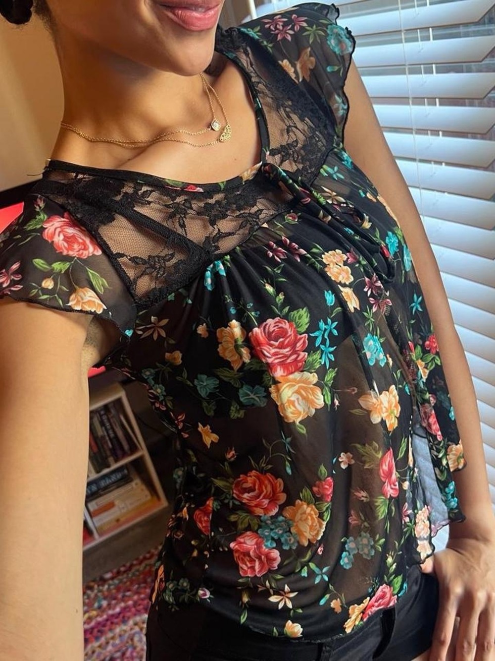 Black floral sheer cap sleeve blouse, black lace panels, tie front detail